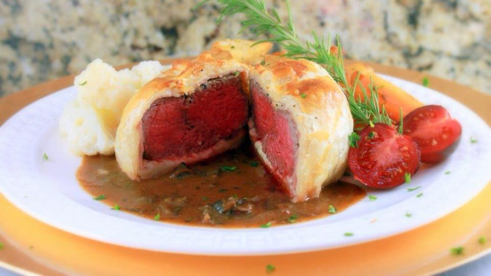 BreakedSteak beef wellington on a plate